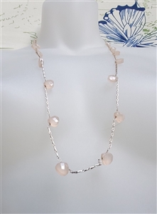 Vintage Banana Republic long necklace with faceted pale pink elements and BR tag