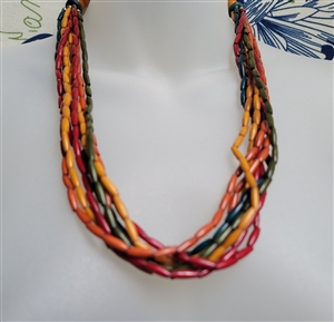 Vintage multi strand earth tone tubular bead necklace front view showing waterfall design