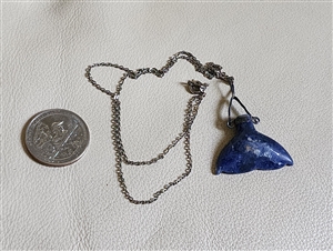 preowned vintage nakagawa japan hand carved stone whale tail pendant necklace with blue inlay and silver tone chain