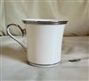 Vintage 1965 Lenox Solitaire ivory porcelain drinking mug with a polished platinum trim on a warm ivory body