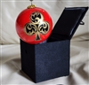 Preowned vintage handblown glass ornament with red and black club design in box