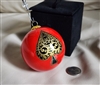 Preowned vintage handblown glass ornament with red and black spade design in box