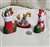 Set of 3 vintage hand-painted ceramic Christmas ornaments including a rocking horse and two stockings shown with reference coin