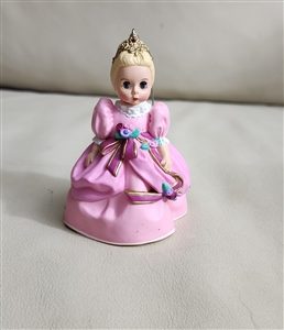 1995 Madame Alexander Cinderella Hallmark Keepsake ornament with spots on the dress and a folded box