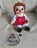 Preowned 1971 Bobbs Merrill Raggedy Ann ceramic figurine and handmade decoupage ornament