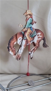 Vintage wooden jumping jack pull string cowboy ornament by Midwest Imports with movable legs, cowboy arm, and horse head