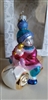 Nordstrom glass holiday ornament a girl on a sled colorful vintage ornaments