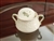 Porcelain lidded sugar bowl embossed leaves with green accents by Alfred Meakin