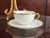White and gold porcelain teacup and saucer by Meito Japan