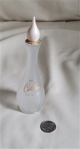 Vintage Avon Cotillion cologne bottle with frosted glass finish and decorative topper