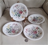Spode Romney floral porcelain saucers with embossed wicker edges, set of four
