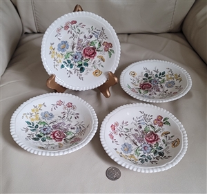 Spode Romney floral porcelain saucers with embossed wicker edges, set of four