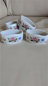 Set of 4 vintage Andrea by Sadek white porcelain napkin rings with colorful floral designs made in Japan