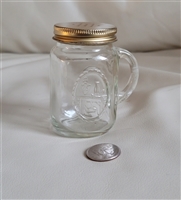Pre-owned vintage Anchor Hocking glass shaker with gold metal lid and embossed T For Home Canning detail
