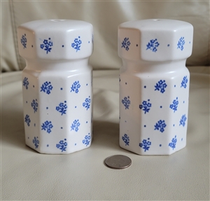 Set of 2 white and blue large octagonal ceramic salt and pepper shakers shown with reference coin