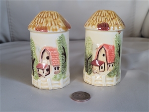 MR Pottery 1988 embossed house salt and pepper shakers set showing front design