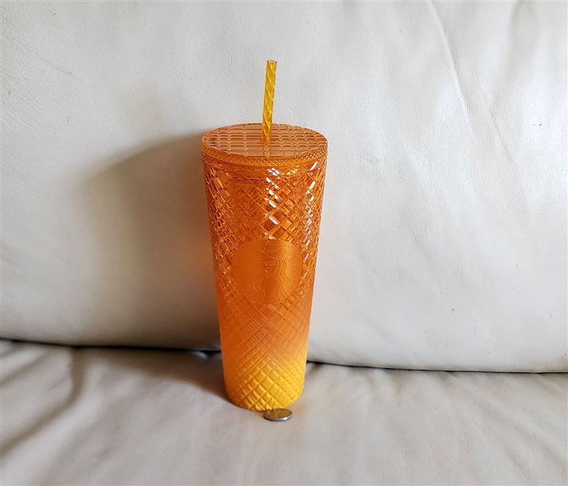 Starbucks 24oz amber orange grid textured venti cold cup with matching flat lid and straw