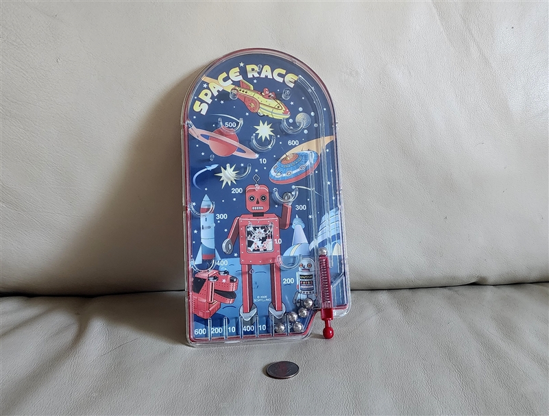 Schylling Space Race handheld pinball game 2006 retro robot edition with red plunger launcher