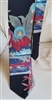 Pre-owned vintage Robert Stock 100% silk tie with a colorful beach scene featuring a classic car, bicycle, and palm trees.
