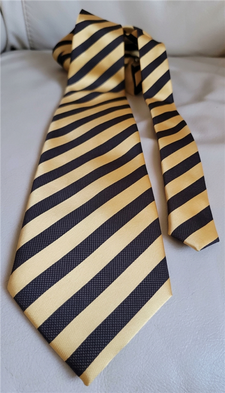 Pre-owned vintage Giorgio Armani 100% silk tie with gold and black diagonal stripes, handmade in Italy.