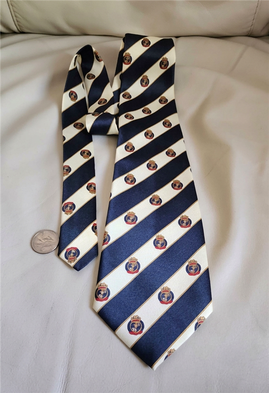 Vintage 1990s Rene Chagal mens silk tie with diagonal stripes and medallion accents