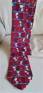 Pre-owned vintage Peanuts silk tie featuring Snoopy in an I Hate to Lose grid pattern on a red background