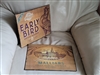 Set of two metal bourbon advertising wall decor signs featuring Malliars and Early Bird