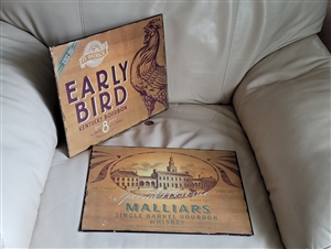 Set of two metal bourbon advertising wall decor signs featuring Malliars and Early Bird