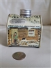 Vintage log cabin tin box with New Hampshire maple syrup design showing preowned condition