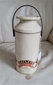 Preowned vintage 1992 Baileys Irish Cream milk can shaped tin storage box container with a swinging plastic handle top off view