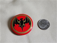 Collectible Bacardi bat blinking pin with red light and black logo