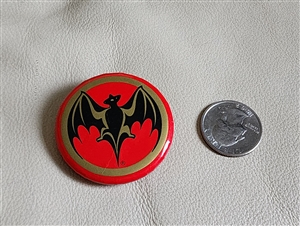Collectible Bacardi bat blinking pin with red light and black logo