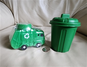 Recycling themed storage bins in green plastic truck and bin