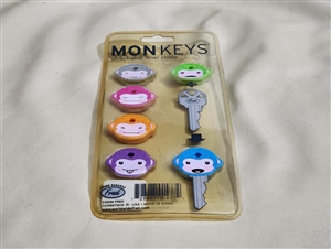 Vintage Monkey shaped colorful key covers markings 2006
