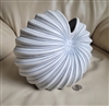 Preowned white and blue dotted porcelain sea shell vase in an elegant contemporary abstract cockle design