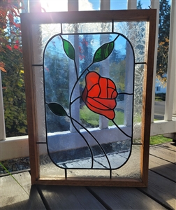 Handcrafted stained glass picture frame featuring a red rose design with decorative leaded glass borders 1980s