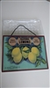 Preowned decorative glass wall sign featuring California lemons advertisement