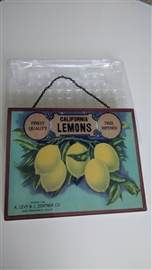 Preowned decorative glass wall sign featuring California lemons advertisement