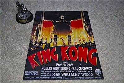 preowned vintage king kong nineteen thirty three french magazine print with nyc souvenir metal statue on wood base