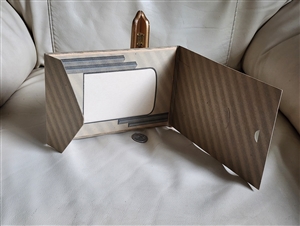 Vintage cardboard envelope picture frame in gray and black colors