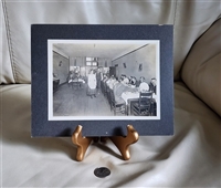 Vintage black and white dinner photography with people inside of the room