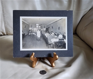 Vintage black and white dinner photography with people inside of the room