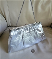 HL Harry Lavine silver tone clutch with chain in silver tone with large storage design