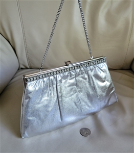 HL Harry Lavine silver tone clutch with chain in silver tone with large storage design