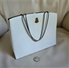 Vintage After Five white hard case evening bag showing a yellowish ivory age patina on one side with a matching coin purse and silver metal chain
