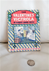 Antique 1919 softcover booklet titled The Valentines Victrola by Harriet Lummis Smith with colorful illustrated cover