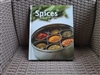 Hardcover book of SPICES a cook's guide to spicy recipes by Paragon Books..