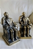 pair of heavy vintage cast metal abraham lincoln seated bookends in antique gold patina