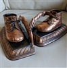 vintage baby shoe bookends in copper color finish