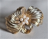 Vintage 1970s M Jent gold tone ribbon brooch with central cluster of faux pearls front and back view